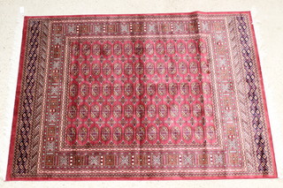 A Belgian cotton Bokhara style red and blue ground rug 73"  x 56" 
