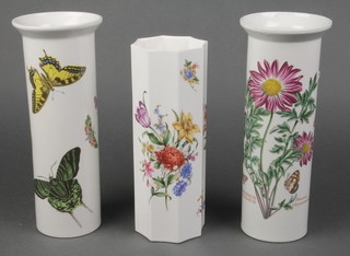 A Royal Worcester vase with floral decoration 8" and a pair of Portmeirion Royal Botanic Garden vases decorated butterflies 9" 