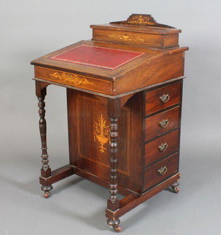 A Victorian inlaid rosewood Davenport, the back fitted a stationery box, the pedestal fitted  4 long drawers, raised on turned supports 35"h x 21"w x 21"d 