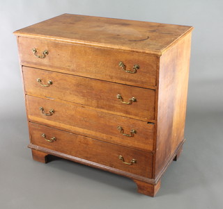 An 18th Century Country oak chest of 4 long drawers with brass swan neck drop handles, raised on bracket feet 36"h x 37"w x 22"d 