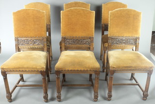 A set of 6 oak framed Cromwellian style dining chairs on turned supports with H framed stretchers 