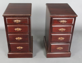 A pair of 19th Century rectangular mahogany pedestal chests fitted 4 long drawers, with gilt swan neck drop handles, raised on platform bases 31"h x 16"w x 21"d 