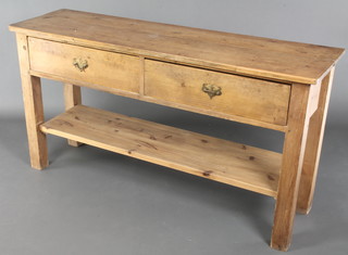 A 19th Century pine dresser base fitted 2 long drawers with brass swan neck drop handles above potboard, raised on square tapered supports 32"h x 60"w x 17"d 