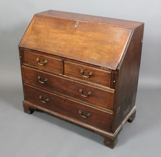A Georgian mahogany bureau with fall front with fitted interior above 2 short and 2 long drawers with brass swan neck handles, raised on bracket feet 39"h x 40"w x 20"d
