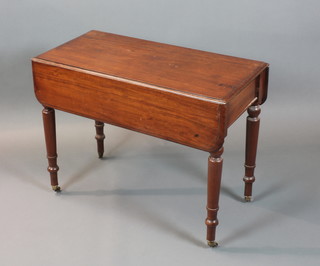 A Victorian mahogany Pembroke table fitted a frieze drawer and raised on turned supports 26"h x 35"w x 17" when closed x 32" when open 
