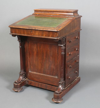 A Victorian mahogany Davenport desk the back fitted a stationery box, the pedestal fitted 4 long drawers, with turned columns to the sides 33"h x 22"w x 22"d 