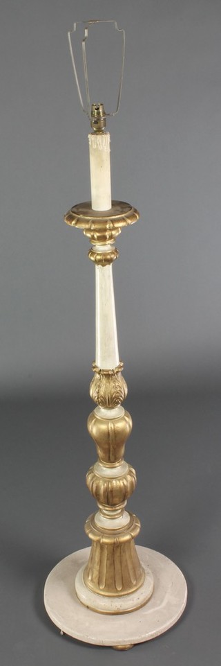 An Italian style white and cream carved painted standard lamp 