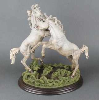 A Country Artists Stallions of the Camargue figure on a wooden socle 14" 