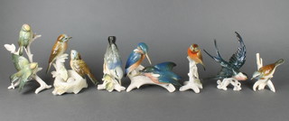 Seven 20th Century Continental porcelain bird groups 
