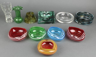A Whitefriars circular bubble glass ashtray and 7 other coloured Art Glass ashtrays, a waisted Art Glass match striker 2" and 2 specimen vases 