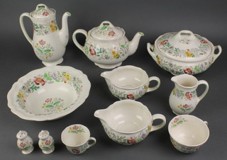 A 75 piece Royal Doulton Stratford pattern dinner/tea service comprising 2 tureens and covers, 3 oval graduated meat plates, bowl, 2 sauce boats, 2 peppers (1 chipped), 6 dinner plates, 6 side plates, bread and butter plate, 6 tea plates, 2 large saucers, teapot, coffee pot (chipped), sugar bowl, cream jug, 6 twin handled soup bowls and saucers, 10 cups and 6 saucers, 6 coffee cups and 6 saucers 