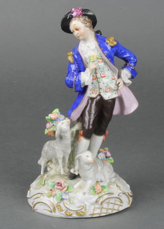 An early 20th Century Sitzendorf figure of a shepherd on a rococo base 7" 