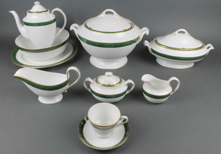 An 81 piece Spode Chardonnay pattern dinner/tea service comprising large circular tureen and cover, oval tureen and cover, a circular platter, circular bowl, 12 soup bowls, 12 dinner plates, 12 side plates (2 with chips to the rim), 12 tea plates, 2 sauce boats, 11 cups, 12 saucers, teapot (crack by handle), twin handled sucrier, sugar bowl and cream jug 