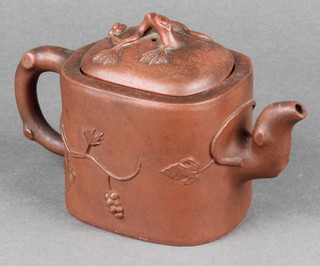 A Chinese Tanware earthenware teapot with rustic handle, the body decorated with mouse appearing from a hole with scrolling grapes, impressed mark 7" 