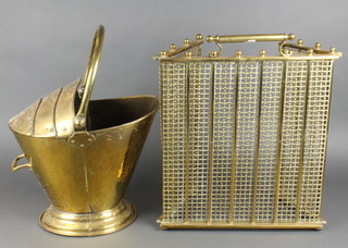 A 19th Century 3 fold brass and mesh spark guard 17"h x 26"w together with a brass helmet shaped coal scuttle 12" 