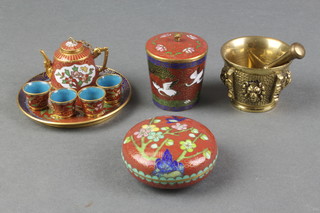 A miniature Japanese Imari cylindrical cloisonne jar and cover 2", ditto circular jar and cover 2", ditto tray 3", teapot and 4 cups together with a miniature mortar and pestle