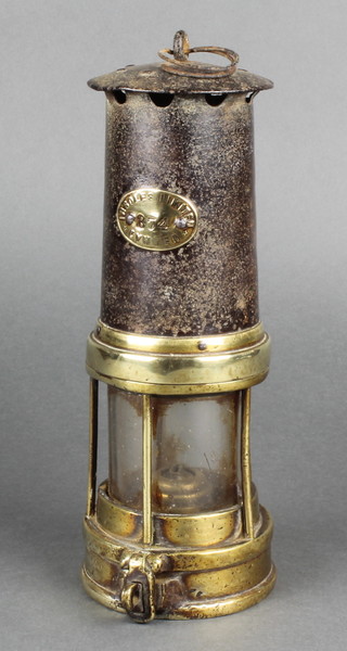 A 19th Century steel and brass miner's safety lamp by Ninsole Ltd of Cymmer no.874  