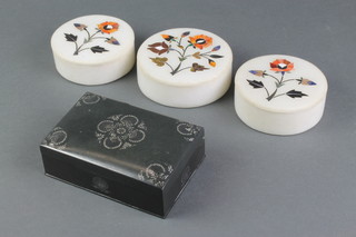 A Burmese "bronze" trinket box with hinged lid 2" x 5" together with 3 cylindrical Indian marble jars and covers, the lids inlaid specimen marble 