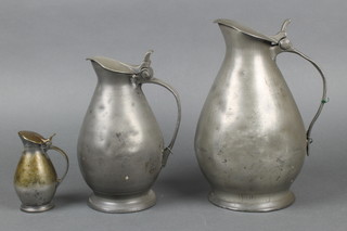3 graduated Continental pewter pear shaped lidded jugs 10", 8" and 4 1/2" 