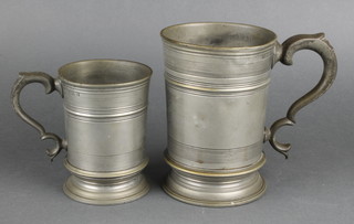A 19th Century pewter quart measure with C scroll handle together with a 1 pint ditto 