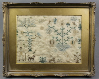 An embroidery sample panel decorated animals, figures and trees 6" x 7" 