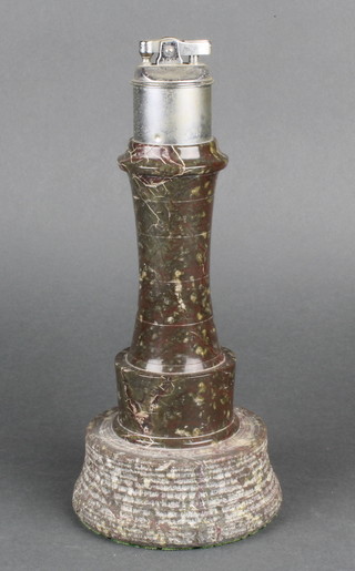 A Cornish serpentine table lighter in the form of a lighthouse 10" 