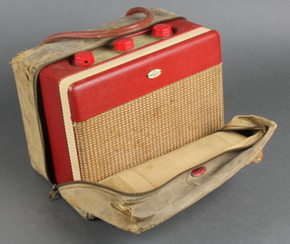 A Roberts portable radio model R200 Junior complete with fibre carrying case  
