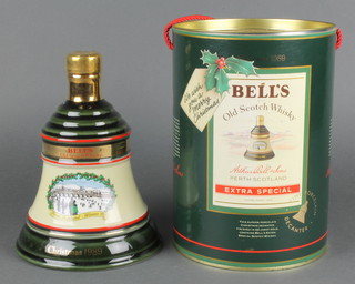 A 1989 Bell's Wade Whisky decanter containing approx. 75cl of whisky 
