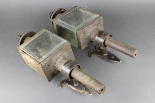 A pair of 19th Century rectangular metal coaching lamps with mounting brackets, 1 with cracked glass