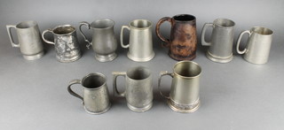 A 19th Century pewter half pint tankard, do. pewter baluster tankard by James Dixon marked Saracen's head and a black leather Black Jack tankard and 7 other pewter tankards