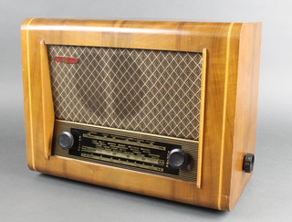 A Pye radio contained in a walnut case 