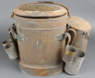 Of Horsham interest, an oval 19th Century metal milkman's churn 13" with hinged lid together with 5 various measures - 2 x pints, 1 half pint, 2 x gills and an oval jar and cover and a miniature churn with swing handle 7", a brass hinged lid marked F V Jobling Highland Farm Dairy Horsham 
