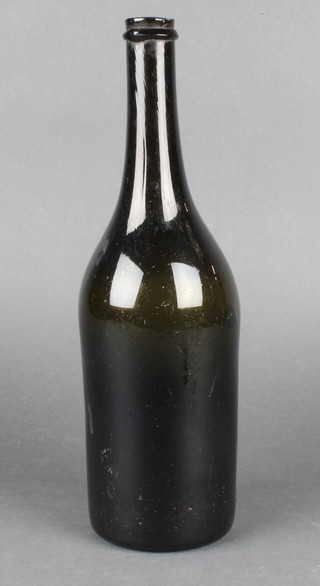 An Antique green glass wine bottle 12" 