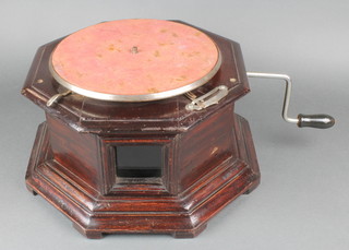 A manual gramophone contained in a octagonal wooden case, raised on bracket feet (no arm or horn) 