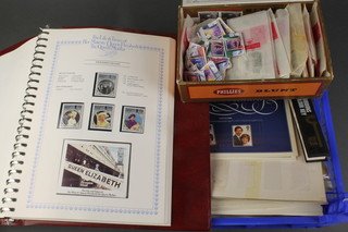 A Stanley Gibbons album of various Commonwealth stamps celebrating the life and times of HM Queen Elizabeth The Queen Mother and loose presentation stamps etc