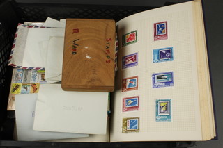 A blue Viking stamp album containing used stamps including India, Italy, Bahamas, Hungary and other stamps 