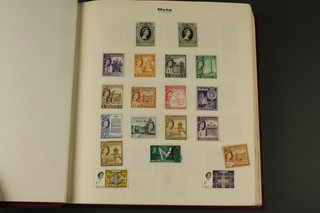 An album of various mint and used stamps including Malta, Niue, Norfolk Island, Pakistan, Papua New Guinea 