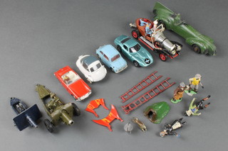 A 1930's cast metal model of a racing car, a Corgi model of Chitty Chitty Bang Bang (girl figure missing), do. Whizz Wheels micro 3 litre, a Spot On model of an MG Midget Mk 2, do. Fiat 500, Quiralu model of a bubble car, a Britain's model of a field gun and 1 other field gun and various figures 