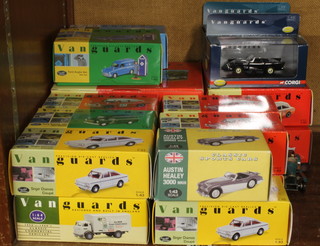 A Vanguard RD3002 Ford Anglia and Hillman Imp racing diorama and 20 other Vanguard cars, all boxed 