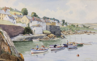 Arthur Dooley, watercolour, a Cornish inlet scene with fishermen preparing boats, signed 12" x 18 1/2" 