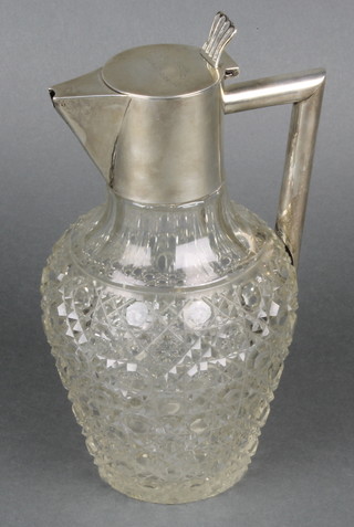 An Edwardian silver mounted cut glass spirit jug with engraved inscription, London 1903 8 1/2" 