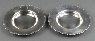A pair of silver shallow dishes with fancy rims, 101 grams, 4" 