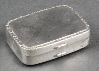 A Continental rounded rectangular silver box with fancy rim, 1 1/2" x 1" 