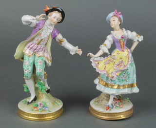A pair of early 20th Century Sitzendorf figures of a lady and gentleman dancing, on raised circular gilt bases 7 1/2" 