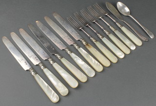 A part set of Georgian silver and mother of pearl dessert eaters comprising 7 knives with chased armorials and 5 forks together with a silver spoon and a silver butter knife