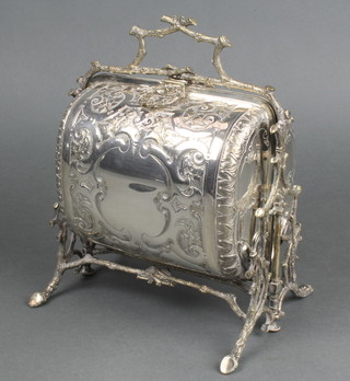 An Edwardian silver plated 2 division folding biscuit box on a rustic base
