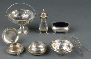A pierced silver basket with swing handle, Birmingham 1920, 3.5", a silver mustard and pepper, an infuser and 2 silver watch cases 