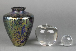 An Okra Studio Glass purple tapered vase 5", a glass apple paperweight and a faceted crystal ditto 