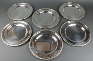 A set of 6 Georgian design silver plated dinner plates with gadrooned rims