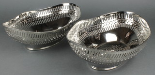 A pair of oval silver plated pierced bowls 15"